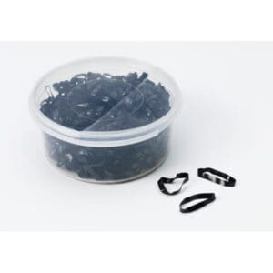 A container of black plastic with some small pieces